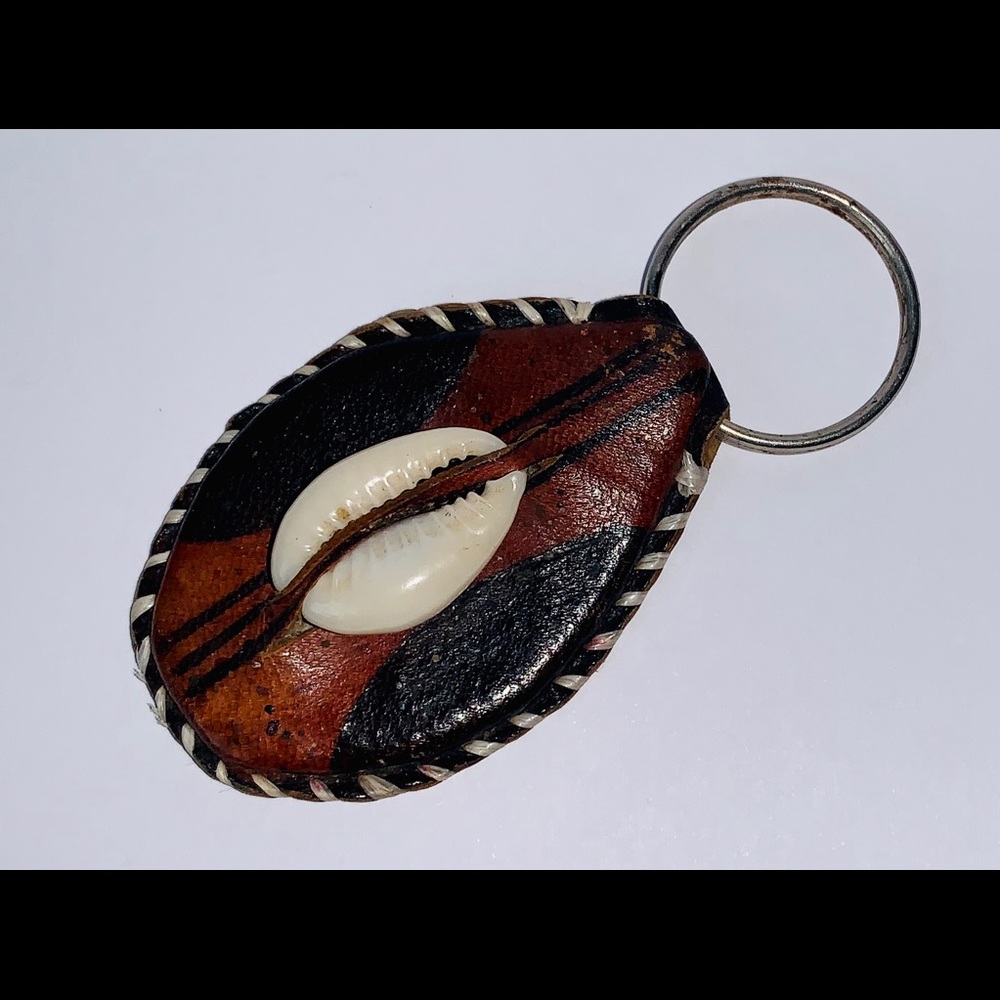 🏈 Oval-shaped 100% leather key ring